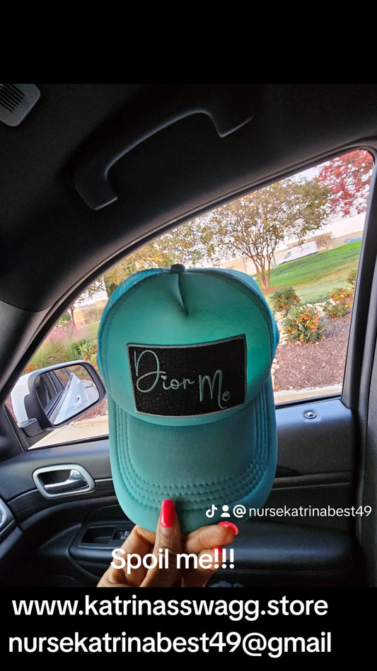 Light blue trucker hat with silver glittery patch and blue letters/ border